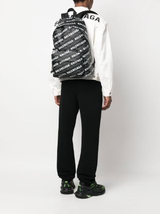 Balenciaga signature logo-print backpack Veronique Luxury Collections