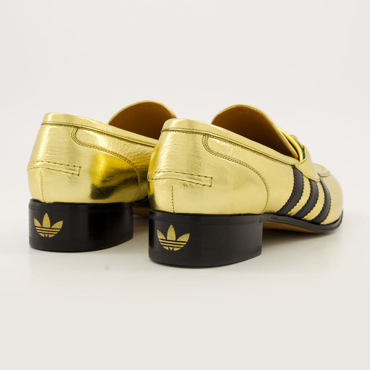 GUCCI X ADIDAS  Gold & Black Leather Quentin Snaffle Loafers Veronique Luxury Collections